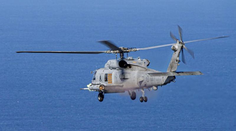 An MH-60R helicopter fires a laser-guided rocket off the NSW south coast during Exercise Tigerfish 2023. Photo by Chief Petty Officer Cameron Martin.