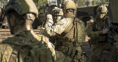 Australian Army soldiers from Combat Team Viper discuss tactics during Exercise Viper Strike at Gallipoli Barracks, Enoggera. Photo by Captain Cody Tsaousis.