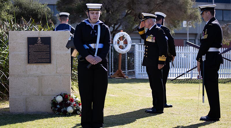 Commander Australian Fleet Rear Admiral Christopher Smith salutes after laying a wreath during the HMAS Westralia 25th year Memorial Service at HMAS Stirling, Western Australia. Photo by Able Seaman Rikki-Lea Phillips.