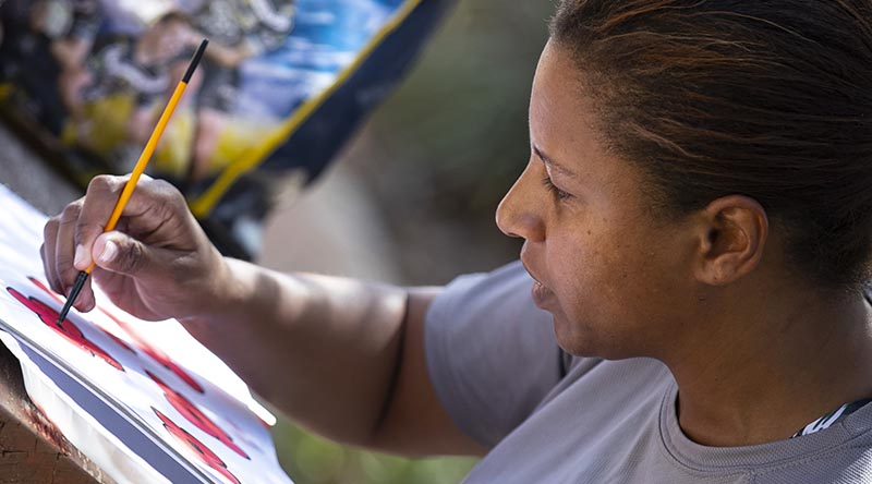 Australian Army Warrant Officer Class Two Anne Dufficy who is deployed on Operation Mazurka as part of the Multinational Force and Observers in the Sinai Peninsula, Egypt, is showcasing Indigenous culture with her paintings at South Camp. Photo by Corporal Melina Young.