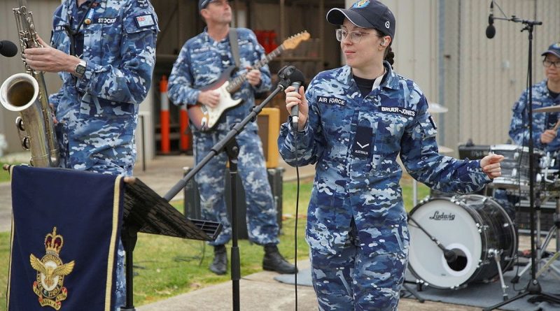 Air Force Rock Band AV8 musician Leading Aircraftwoman Chloe Bruer-Jones performs during the Soldier On March On Challenge event at RAAF Base Williams in Victoria. Story by Leading Aircraftwoman Jasna McFeeters. Photos by Sergeant Ralph Whiteoak.