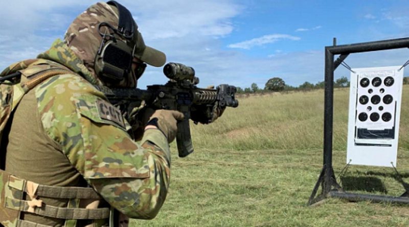 A 4 Squadron combat controller practises enhanced combat shooting skills at Singleton Military Training Area, NSW.