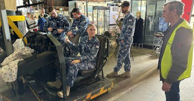 From left, Aircraftman Max Webb, Pilot Officer Toby Olabarriaga, Aircraftwoman Ellie Hawke and Corporal Eliott Jones get a lesson on the cockpit module of the B-24 Liberator from Paul Rourke at the B-24 Liberator Restoration Museum. Story and photo by Flight Lieutenant Brent Moloney