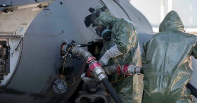 RAAF personnel from 23 Squadron prepare to refuel a C-17A Globemaster III aircraft as part of Exercise Toxic Gauntlet at RAAF Base Amberley, Queensland. Story by Flight Lieutenant Suellen Heath. Photo by Leading Aircraftwoman Taylor Anderson.