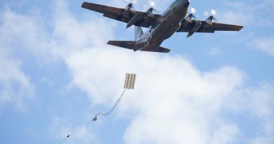 A Republic of Singapore Air Force C-130H Hercules drops a heavy equipment platform. Story by Tastri Murdoch. Photo by Aircraftwoman Maddison Scott.