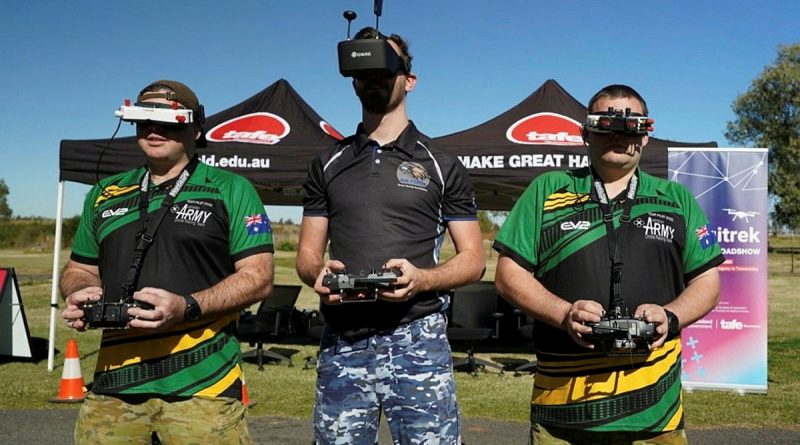 Drone racers Sapper Alex Brown, Flight Lieutenant Jayden Hasemann and Lance Corporal Daniel McCullock fly their drones during the Queensland TAFE "DigiTrek" Roadshow. Photo by Captain Sarah Vesey.