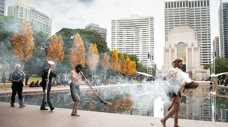 Local indigenous cultural performers conduct a smoking ceremony during the Indigenous Veterans Commemoration at Hyde Park, Sydney. Story by Corporal Jacob Joseph. Photo by Leading Seaman Susan Mossop.