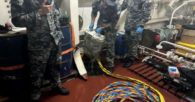 Navy clearance divers extract packages of cocaine from a flooded ballast tank in the bulk carrier MV St Pinot. Story by Lieutenant Commander Andrew Herring.