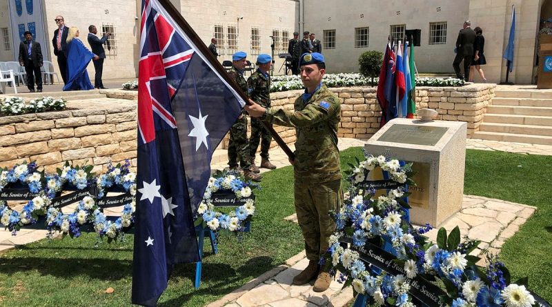 Major Andrew Moses as the Australian flagbearer for the 75th anniversary to the United Nations Truce Supervision commemorative event in Jerusalem, Israel. Story by Major Carrie Robards.