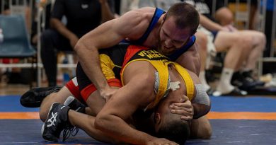 Navy Able Seaman Kyle Mainey, in blue, competes in the freestyle wrestling 92kg division at the 2023 Senior National Wrestling Championships at PCYC Lang Park, Brisbane. Story and photo by Corporal Jacob Joseph.