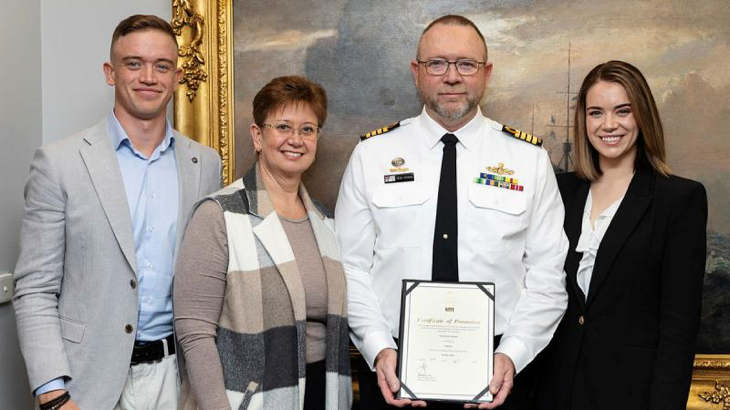 Captain Sean Feenan with his family after being promoted to captain at Russell Offices in Canberra. Story and photo by Petty Officer Jake Badior.