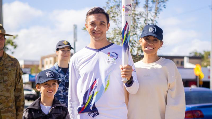 Lieutenant Aaron McCready with his sister, Flying Officer Nadine Muller, and their nephew, Madden Muller (wearing his great-grandfather Corporal Mervyn McCready's medals). Story by Captain Catherine Batch. Photo by Callum Smith.