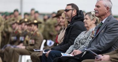 Doug and Kaye Baird, parents of Australian Army soldier Corporal Cameron Baird, VC, MG, and Cameron's brother Brendan Baird at the 2nd Commando Regiment memorial service, Holsworthy Barracks, Sydney, to mark the 10th anniversary of Corporal Baird's death in action in Afghanistan. Photo by Corporal Lisa Sherman.