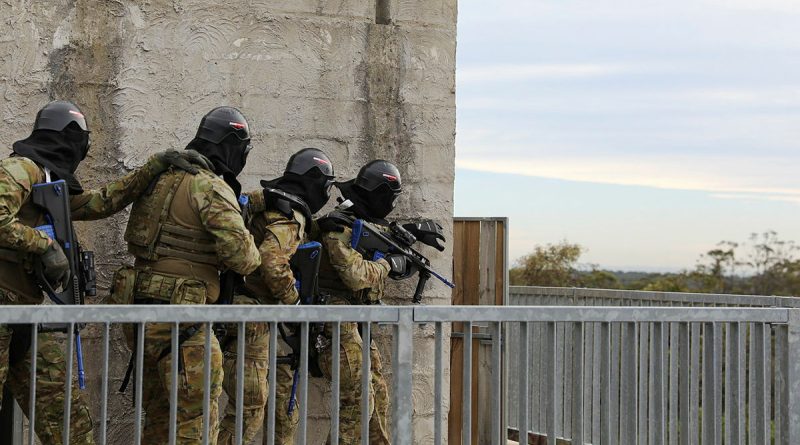 Army reservists from the 5th Brigade conduct an entry drill using airsoft rifles at Holsworthy Training Area at the end of Exercise Arras Sprint in May. Story by Major Jesse Robilliard. Photo by Private Sarah Fisher.