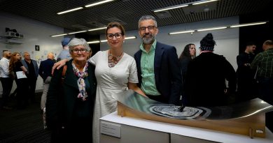 ADF Arts for Recovery, Resilience, Teamwork and Skills program participant Petty Officer Lee-Anne Cooper with her family at the showcase event at the University of Canberra’s Inspire Centre. Story by Flight Lieutenant Thomas McCoy. Photo by Corporal Madhur Chitnis.