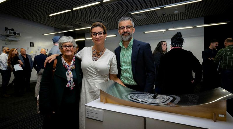 ADF Arts for Recovery, Resilience, Teamwork and Skills program participant Petty Officer Lee-Anne Cooper with her family at the showcase event at the University of Canberra’s Inspire Centre. Story by Flight Lieutenant Thomas McCoy. Photo by Corporal Madhur Chitnis.