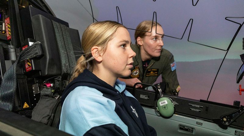 2 Flying Training School trainee Pilot Officer Gabrielle Adamson takes Air Force Indigenous Youth Program participant Indiana Baines through the paces of a Pilatus PC-21 simulated flight at RAAF Base Pearce, WA. Story by Stephanie Hallen. All photos by Flying Officer Michael Thomas.