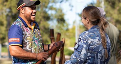 Rhan Hooper chats with Indigenous Liaison Officer Flight Lieutenant Sarah Woods during his visit to the Yarning circle at RAAF Base Amberley, Queensland. Story by Flight Lieutenant Greg Hinks. Photo by Leading Aircraftman Taylor Anderson.