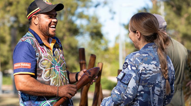 Rhan Hooper chats with Indigenous Liaison Officer Flight Lieutenant Sarah Woods during his visit to the Yarning circle at RAAF Base Amberley, Queensland. Story by Flight Lieutenant Greg Hinks. Photo by Leading Aircraftman Taylor Anderson.