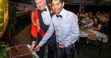 Major General Douglas Laidlaw cuts the cake with Cadet Zhyler Cawit during the 230 Army Cadet Unit 25th anniversary celebration. Story by Stacey Doyle. Photo by Shane Brandon.