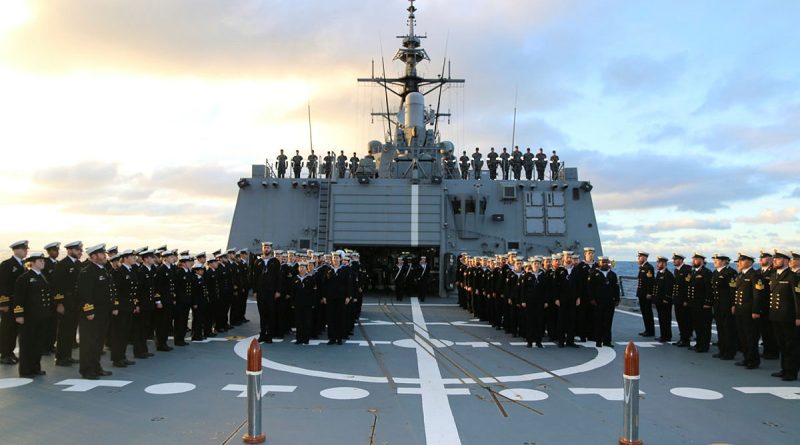 HMAS Sydney V ship's company stand at attention as the Catafalque Party mount the cenotaph, during a commemoration to honour the loss of HMAS Sydney II and HSK Kormoran. Story by Midshipman Lewis Taulier and Midshipman James Turnour. All photos by Petty Officer Aaron Clancy.