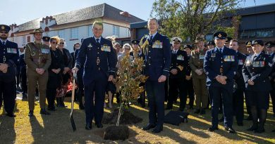 Outgoing Air Commander Australia Air Marshal Darren Goldie, left, and incoming Air Commander Australia Air Vice-Marshal Glen Braz, right, plant a tree after the change of command ceremony at RAAF Base Glenbrook. Story by Squadron Leader Chloe Stevenson. Photo by Leading Aircraftman Chris Tsakisiris.