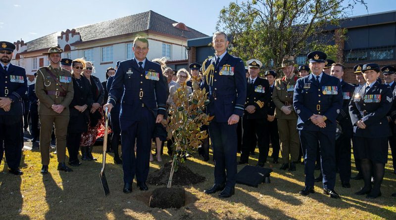 Outgoing Air Commander Australia Air Marshal Darren Goldie, left, and incoming Air Commander Australia Air Vice-Marshal Glen Braz, right, plant a tree after the change of command ceremony at RAAF Base Glenbrook. Story by Squadron Leader Chloe Stevenson. Photo by Leading Aircraftman Chris Tsakisiris.