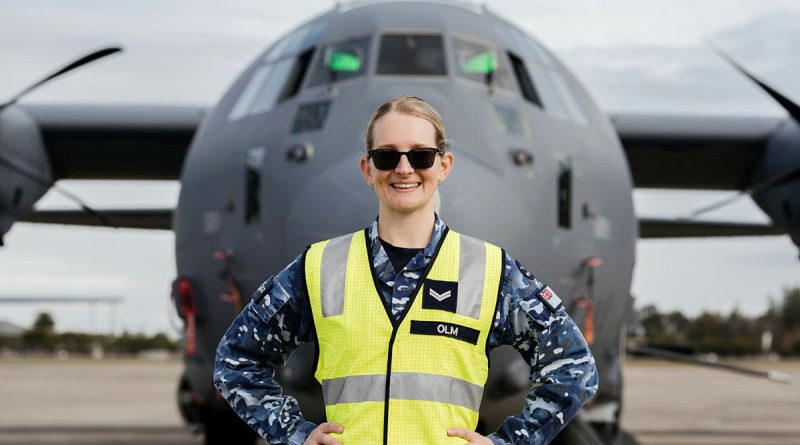 Corporal Teneale Olm from 22 Squadron Air Movements section stands in front of a US Air Force AC-130J Ghostrider at RAAF Base Richmond during Exercise Teak Action. Story by Flight Lieutenant Claire Campbell. Photo by Corporal John Solomon.