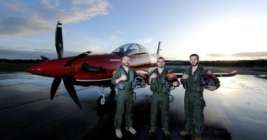 270 ADF Pilots' Course graduates (from left) Lieutenant Michael Harrigan, Lieutenant Gregory Cook and Lieutenant Harrison Coldwell pose for a photo at dawn on the flight line with a Pilatus PC-21 aircraft at RAAF Base Pearce in WA. Story by Stephanie Hallen. Photos by Chris Kershaw.
