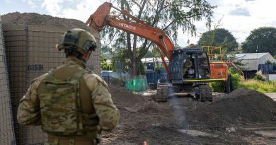 An Australian Army soldier from the 6th Engineer Support Regiment, assists in filling Hesco barriers for protective works during Operation Render Safe, Nauru. Story by Captain Karam Louli . Photo by Sergeant Jarrod McAneney.