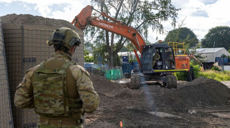 An Australian Army soldier from the 6th Engineer Support Regiment, assists in filling Hesco barriers for protective works during Operation Render Safe, Nauru. Story by Captain Karam Louli . Photo by Sergeant Jarrod McAneney.