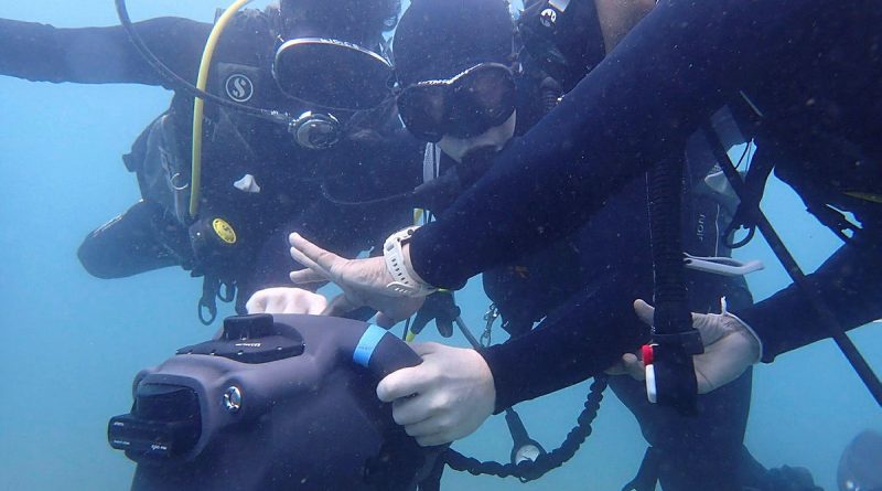 Sri Lanka Navy divers and Royal Australian Navy clearance divers underwater during an exerciseas part of Indo-Pacific Endeavour 2023. Story by Flight Lieutenant Claire Burnet. All photos by Lieutenant Joe Woods.