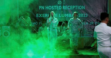 HMAS Anzac officer Lieutenant Charlotte Rice performs with the Philippine Navy band during the Exercise Lumbas official reception on board BRP Tarlac in Subic Bay, Philippines. Story by Lieutenant Max Logan. Photos by Leading Seaman Jarryd Capper.