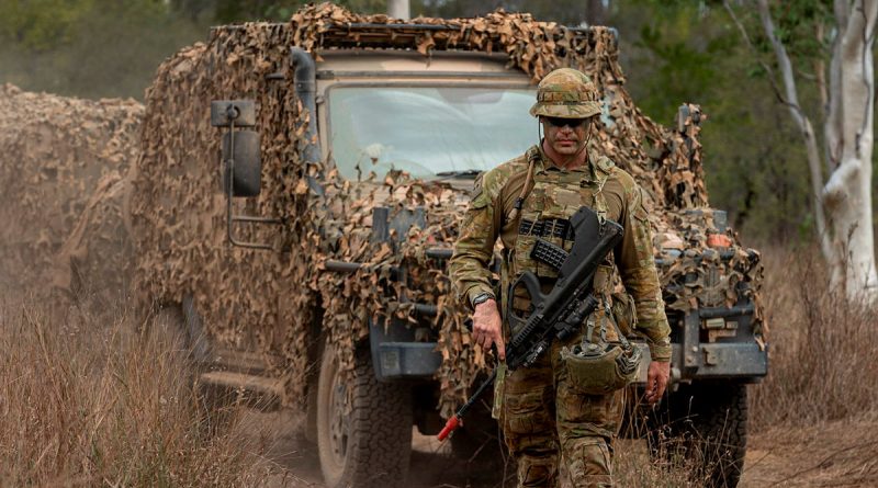 An Australian Army Lieutenant from the 7th Combat Signal Regiment guides a G-wagon during Talisman Sabre. Story by Major Roger Brennan. Photos by Corporal Nicole Dorrett.