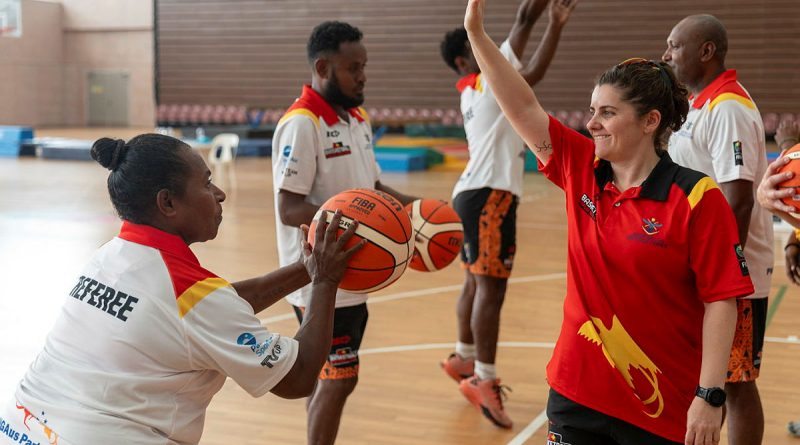 Lieutenant Jo Mercieca mentors local basketball coaches during an ADF Sports training program at the Taurama Aquatic and Indoor Centre, Papua New Guinea. Story by Squadron Leader Amanda Scott. Photos by Leading Seaman Matthew Lyall.