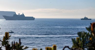 HMAS Canberra guides USS Canberra through Sydney Heads. Photo by Able Seaman Benjamin Ricketts.