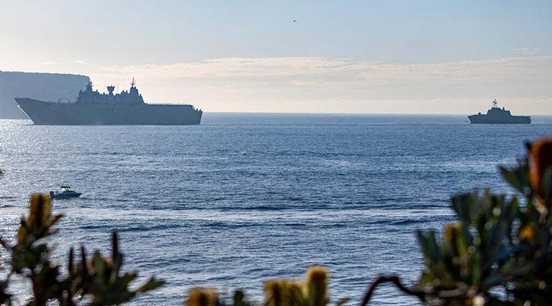 HMAS Canberra guides USS Canberra through Sydney Heads. Photo by Able Seaman Benjamin Ricketts.