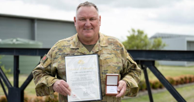 Warrant Officer Class Two Andrew Payne, of 6th Engineer Support Regiment, with the Federation Star clasp to his Defence Force Long Service Medal and a Certificate of Appreciation in recognition of 40 years of service to the ADF. Story by Captain Evita Ryan. Photo by Warrant Officer Class 2 Kim Allen.