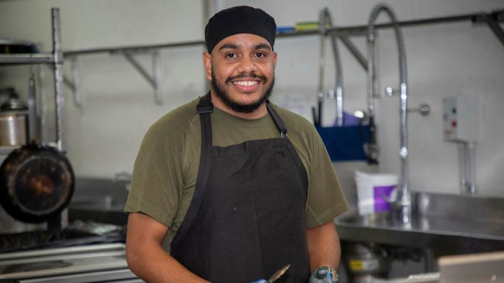 Leading Aircraftman David Skeen, 13 Squadron chef, prepares food in the kitchen of the officers mess at RAAF Base Darwin in the Northern Territory. Story by Flight Lieutenant Greg Hinks. Photo by Sergeant Pete Gammie.