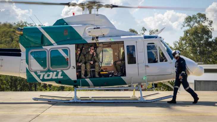 Australian Army soldiers from 2nd Health Battalion board the Toll Bell 412 helicopter after watching a demonstration of Army Aviation's Aircraft Crash Response capability at Gallipoli Barracks, Brisbane. Story by Corporal Jacob Joseph.