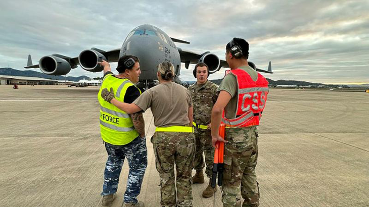 RAAF and USAF members work together during the arrival of a USAF C-17 Globemaster III into RAAF Base Townsville from Joint Base Charleston, South Carolina, as part of Exercise Mobility Guardian. Story and photo by Flight Lieutenant Tanya Carter.