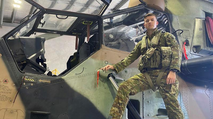 Army pilot Captain Andrew Amos stands bedside an armed reconnaissance helicopter Tiger at 1st Aviation Regiment at Robertson Barracks, Darwin. Story and photo by Flight Lieutenant Nicholas O'Connor.