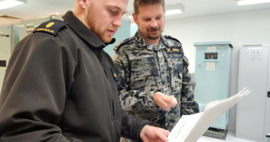 Lead communications technician instructor Petty Officer Christopher Smyth instructs Able Seaman Caleb Pope in the operation and maintenance of the main broadcast system on an Anzac-class frigate at the Navy Engineering Systems Centre at HMAS Stirling. Story by Richard Wilkins.