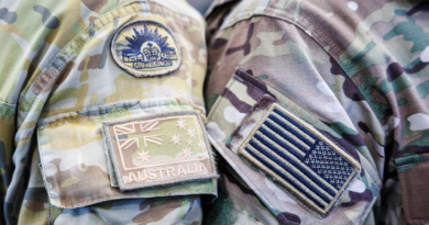 An Australian Army special forces soldier from 2nd Commando Regiment and a United States Army soldier from 1st Special Forces Group prepare for a static-line parachuting training jump side-by-side at RAAF Base Richmond in Sydney ahead of Exercise Talisman Sabre 2023. Photo by Corporal Cameron Pegg.