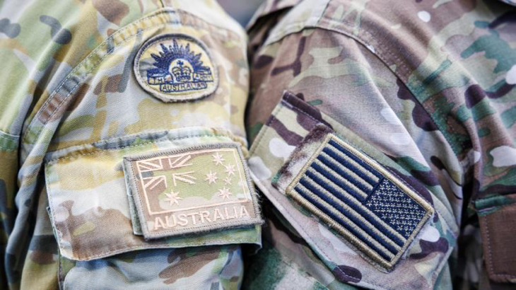 An Australian Army special forces soldier from 2nd Commando Regiment and a United States Army soldier from 1st Special Forces Group prepare for a static-line parachuting training jump side-by-side at RAAF Base Richmond in Sydney ahead of Exercise Talisman Sabre 2023. Photo by Corporal Cameron Pegg.