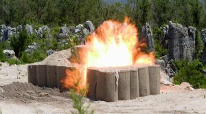 A 500lb Mark 12 bomb is detonated inside a Hesco bunker in Nauru. Photo by Sergeant McAneney.