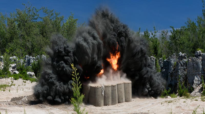 A 500lb Mark 12 bomb is detonated inside a Hesco bunker in Nauru. Photo by Sergeant McAneney.