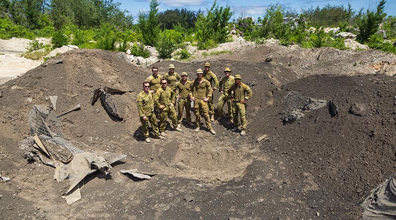 Australian Army personnel stand at the disposal site after the detonation of a 500lb Mark 12 bomb in Nauru. Photo by Corporal Sam Price.