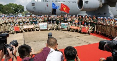 Vietnam’s President Võ Văn Thưởng with peacekeepers from the Vietnam People's Army Level Two Field Hospital contingent - Rotation Five, alongside a Royal Australian Air Force C-17A Globemaster during a farewell ceremony from Ho Chi Minh City, Vietnam, to South Sudan. Photo by Corporal Dan Pinhorn.