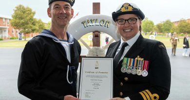Commanding Officer Royal Australian Navy Recruit School, Commander Alisha Withers, right, promotes Seaman Stephen Thompson to the rank of Able Seaman, after the General Entry 413 Taylor Division graduation ceremony at HMAS Cerberus, Victoria. Photo by Leading Seaman James McDougall.